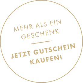 Beiger Kreis mit Text: Mehr als ein Geschenk - Jetzt Gutschein kaufen! auf transparentem Hintergrund.
